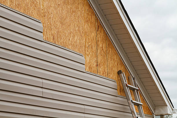 Professional Siding Replacement technician working in Greensboro, NC